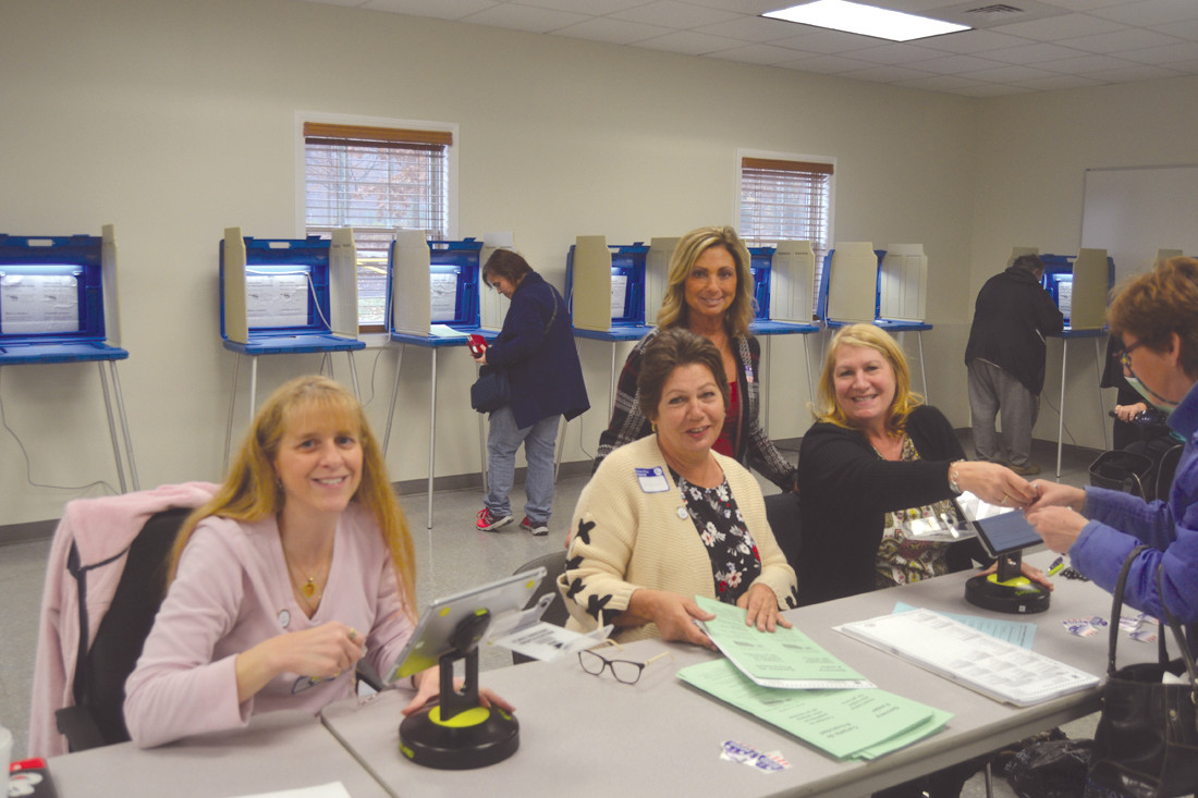 HELPING VOTERS: Cindy Ketchel, Wanda Libutti, Doreen Oxx and Debbie Cotoia helped work the polls and check voters in.